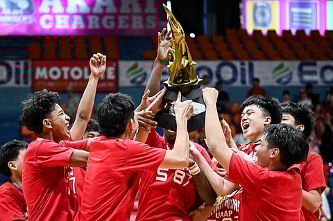 UNIVERSITY of the East celebrates after winning the UAAP Season 87 junior high school basketball title following a 78-47 win over University of Santo Tomas in Game 3 of their best-of-three finals series.