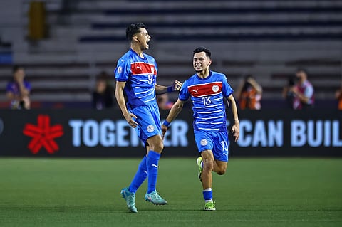 Jarvey Gayoso (No. 9) strikes for the Philippines in their 1-1 draw with Vietnam in the ASEAN Mitsubishi Electric Cup.