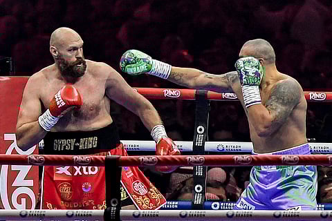 Oleksandr Usyk (right) punches his way to a unanimous decision over Tyson Fury in their heavyweight title rematch in Riyadh, Saudi Arabia.