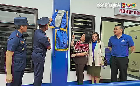 SM Foundation Inc. executive director Connie Angeles unveils the marker for the newly-renovated Camp Bagong Diwa Hospital in Baguio City