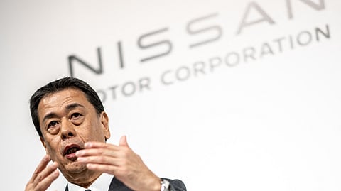 Makoto Uchida, President and CEO of Nissan Motor Corporation, attends a joint press conference with Toshihiro Mibe, President and Representative Executive Officer of Honda, and Takao Kato, President and CEO of Mitsubishi Motors (not pictured), in Tokyo on 23 December 2024. Japanese auto giants Honda and Nissan said they aim to list a new holding company in August 2026 as the pair announced they are entering talks on a merger.