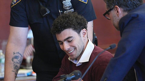 NEW YORK, NEW YORK - DECEMBER 23: Luigi Mangione appears for his arraignment at Manhattan Criminal Court on 23 December 2024 in New York City. Mangione, 26, was arraigned on state murder charges in the killing of UnitedHealthcare CEO Brian Thompson on a Manhattan street on 4 December.