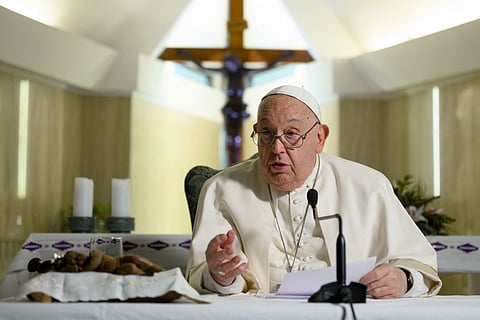This photo taken and handout on 22 December, 2024 by The Vatican Media shows Pope Francis during the Angelus prayer in The Vatican.
