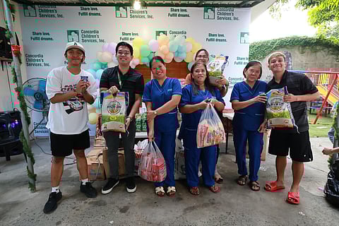 Members of the Collegiate Press Corps bring smile by holding a gift-giving program to orphaned and abandoned children at the Concordia Children’s Services last Monday.