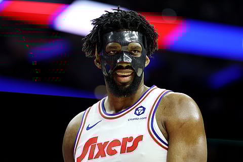 Joel Embiid #21 of the Philadelphia 76ers smiles during the first half against the San Antonio Spurs at the Wells Fargo Center on December 23, 2024 in Philadelphia, Pennsylvania.