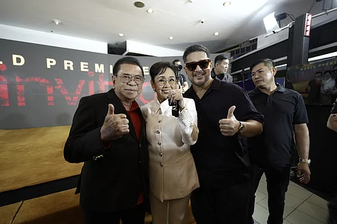 Senatorial candidate Luis 'Manong Chavit' Singson joins movie stars Vilma Santos and Aga Muhlach for the premiere of the movie Uninvited at a cinema in Mandaluyong City which is part of the 50th Metro Manila Film Festival this yuletide season.