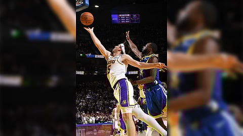 Austin Reaves hits the game-winning layup that lifted the Los Angeles Lakers to a 115-113 victory over the Golden State Warriors in the NBA’s Christmas Day spectacle.