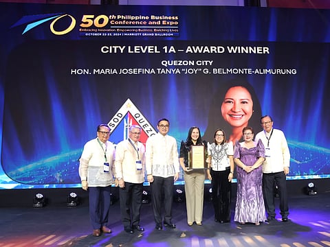 QC once again secured the Most Business-Friendly City Award (City Level 1A - HUCs in NCR) from the PCCI. Mayor Joy Belmonte accepted the recognition with BPLD Head Margie Mejia on stage during the 50th Philippine Business Conference.