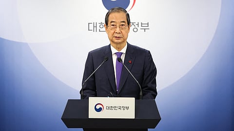 South Korea's acting President Han Duck-soo addresses the nation in Seoul on 26 December 2024, amid an opposition-led impeachment motion.