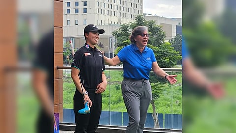 Reigning US Women’s Open champion Yuka Saso is shown with The Country Club general manager Colo Ventosa during a golf clinic at Golf Avenue on Thursday.