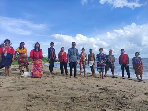 The delegation of the 11th Katutubo Exchange program led its founder, Dr. Edwin Antonio, as they pose at the white sand beach of Nueva Valencia, Guimaras.