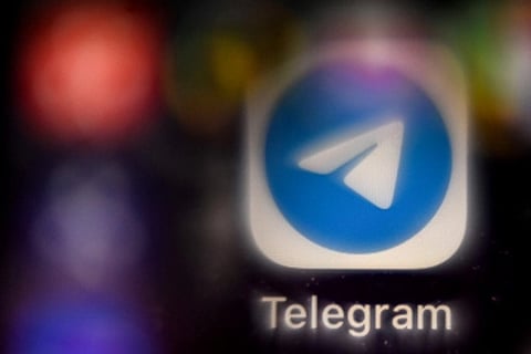 (FILES) A picture taken on November 8, 2021 in Moscow shows the mobile messaging and call service Telegram logo on a smartphone screen. French judicial authorities on August 25, 2024 extended the detention of the Russian-born founder and chief of Telegram Pavel Durov after his arrest at a Paris airport over alleged offences related to the popular but controversial messaging app.