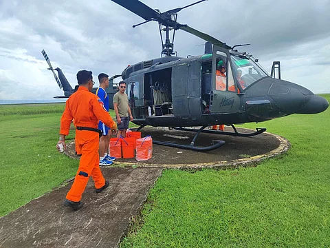 The 505th Search and Rescue Group of the Office of the Civil Defense Region 8 prepare equipment for the aerial survey of the Philippine Coast Guard to locate the sunken vessel. The Office of the OCD-8 also provided hygiene kits to the rescued crew members.