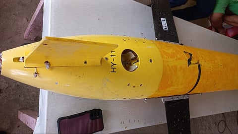 The yellow Chinese submarine drone is capable of transmitting and receiving data, voice messages, and navigation information.