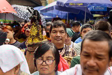 Catholic devotees gather at the Minor Basilica and National Shrine of Jesus Nazareno in Quiapo, Manila, for the first Friday Mass of the year on Friday, after a blessing ceremony for replicas of the Black Nazarene was held the previous day.