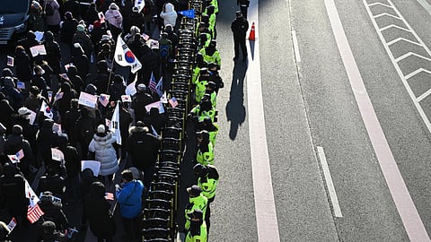 Police keep watch as supporters of South Korea's impeached President Yoon Suk Yeol gather