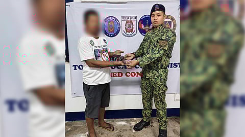 Nueva Ecija rebel waves white flag