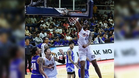 Akil Anthony Mitchell puts an exclamation point to Meralco’s 88-83 victory over Hong Kong Eastern in their PBA Commissioner’s Cup game Sunday at the Smart Araneta Coliseum.