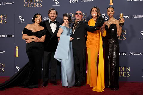 The cast of ‘Emilia Pérez’ Adriana Paz, Edgar Ramírez, Selena Gomez, Jacques Audiard, Karla Sofía Gascón, and Zoe Saldana. The film won Best Motion Picture — Musical or Comedy.