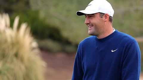 World number one Scottie Scheffler has withdrawn from the US PGA Tour American Express tournament as he continues to recover from a hand injury