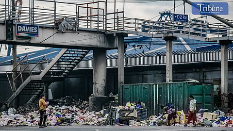 Garbage piles up in Manila amid contractor dispute