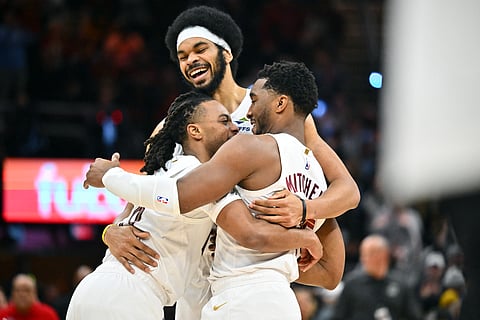 Jarrett Allen (middle) celebrates with Donovan Mitchell (right) and Darius Garland (left) after powering the Cleveland Cavaliers to a 129-122 win over the Oklahoma City Thunder in the NBA regular season.