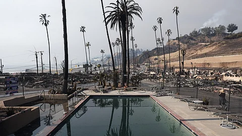 Multiple wildfires fueled by intense Santa Ana Winds are burning across Los Angeles County. At least five people have been killed, and over 25,000 acres have burned. Over 2,000 structures have also burned and almost 180,000 people are under orders to evacuate.
