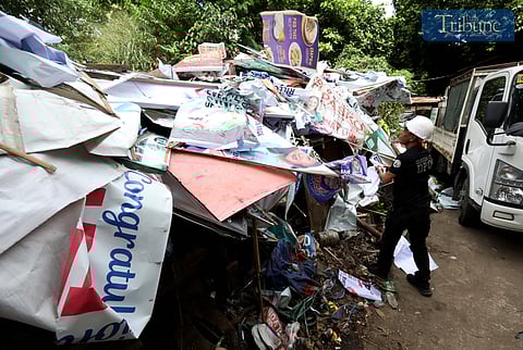 (FILE PHOTO) (January 10 2025) On Friday, January 10, 2025, workers from the Quezon City-Department of Public Order and Safety (QC-DPOS) sort tarpaulins in a vacant lot in Quezon City for proper disposal as part of the local government's Oplan Baklas of illegally posted election and advertising posters. Photo/Analy Labor