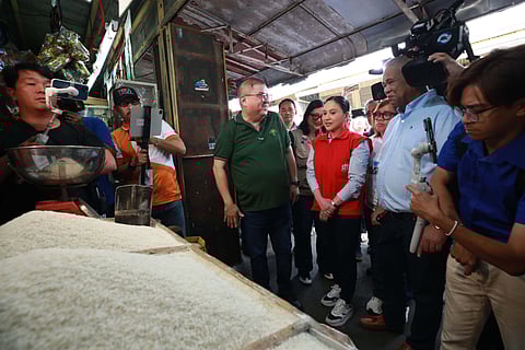 DEPARTMENT of Agriculture Secretary Francisco Tiu Laurel Jr. and Department of Trade and Industry Secretary Cristina Roque conduct a special joint market monitoring by inspecting rice prices and supply at the Murphy Public Market in Cubao, Quezon City. The DA will implement a maximum suggested retail price for imported rice at P58 per kilo beginning 20 January.