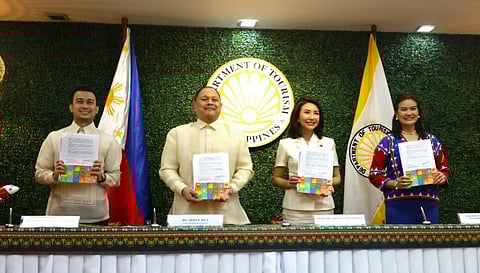 During the signing of the memorandum of partnership to make the country a Muslim-friendly destination are (from left) Santan manager Juan Mari Paolo Paloma, AirAsia CEO Ricky Isla, Tourism Secretary Christina Garcia Frasco and Tourism Undersecretary for Muslim Affairs and Mindanao Promotion Myra Paz Valderrosa Abubakar.