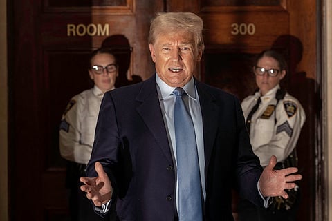 Donald Trump addresses the media before leaving the courthouse for the day at the New York State Supreme Court in New York on October 18, 2023. Donald Trump will be sentenced January 10 for covering up hush money payments to a porn star despite the US President-elect's last-ditch efforts to frustrate a process that would make him the first felon in the White House.
The judge has indicated, however, that Trump will not face prison -- even though the 34 counts of falsifying business records on which he was convicted in May 2024 carry potential prison time. It is instead anticipated that he will receive the mildest criminal sanction available, an unconditional discharge -- a relatively uncommon measure.
