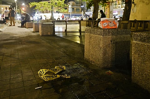 Police tape is pictured where a former Cambodian MP was reportedly shot, in Bangkok on 7 January 2025. A former Cambodian opposition MP was shot dead by a gunman on a motorcycle in Bangkok on 7 January, Thai media reported.