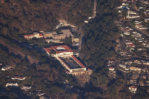 The Getty Villa art museum stands undamaged after the passage of the wind-driven Palisades Fire in the Pacific Palisades neighborhood of Los Angeles, California on 10 January 2025. Massive wildfires that engulfed whole neighborhoods and displaced thousands in Los Angeles have killed at least 10 people, authorities said, as California's National Guard soldiers readied to hit the streets to help quell disorder.
News of the growing toll, announced late Thursday 9 January by the Los Angeles County Medical Examiner, came as swaths of the United States' second-largest city lay in ruins.