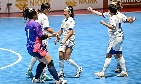 Katrina Guillou delivers for the Philippine women’s futsal team en route to a 4-1 win over Kuwait on Saturday in Tashkent.