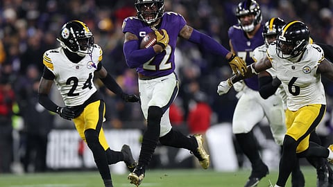 Baltimore's Derrick Henry runs for a touchdown in the Ravens' NFL playoff victory over the Pittsburgh Steelers
