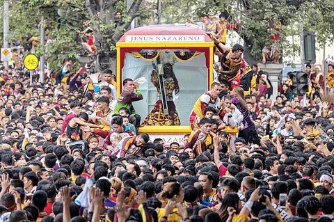 Barefoot devotees participate in a profound collective act of faith during the annual Traslación of the Black Nazarene, a deeply significant religious event in the Philippines. The tradition drew millions of participants in a grand procession of the life-sized statue of Jesus Nazareno through the streets of Manila. The devotees, often clad in maroon and yellow garments symbolizing the Black Nazarene, walk barefoot as a gesture of humility and penance, emulating Christ’s suffering on his way to Calvary. Many reach out to touch the image or hold onto the ropes pulling the andas (carriage) in hopes of spiritual renewal, healing or blessings. Despite the challenges posed by the dense crowds, scorching heat and long hours, devotees remain steadfast, driven by their unwavering belief in the miraculous powers of the Black Nazarene.