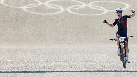 Golden day: Tom Pidcock celebrates his victory in the 2024 Olympic mountain bike event