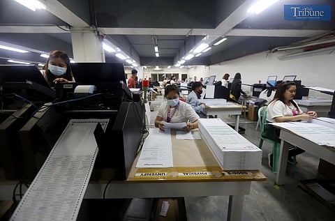 (FILE) Ballot verifiers inspect official ballots inside the National Printing Office (NPO) in Quezon City on Wednesday, 15 January 2025.