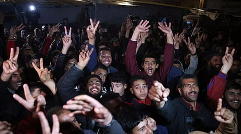 People in southern Gaza celebrate the announcement of a deal to end the 15-month war with Israel