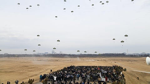 Allied Nations' Airborne jumpers' parachutes brave the sky as residents witness the New Year Jump in Indo-Pacific 2025 on 12 January 2025 in Camp Narashino, Chiba Prefecture, Japan.