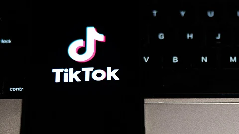 In this photo illustration, the TikTok logo is displayed on a phone on 17 January 2025 in New York City. The Supreme Court unanimously decided to ban the app in the United States.