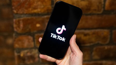 In this photo illustration, the TikTok logo is displayed on a phone on 17 January 2025 in New York City. The Supreme Court unanimously decided to ban the app in the United States.