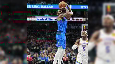 Kyrie Irving lights up the Dallas Mavericks scoreboard with 25 points en route to a 106-98 win over the Oklahoma City Thunder on Friday in their NBA regular season game.