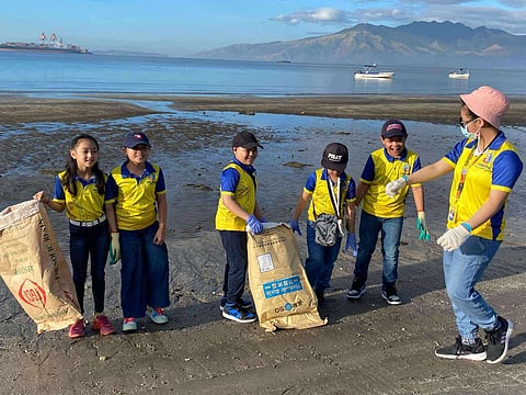 Young students of DepEd Tayo Special Education Center for the Gifted-Kalayaan collect trash in the boardwalk area of SBFZ on 16 January 2025.