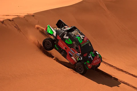 Saudi driver Yazeed Al Rajhi and German co-driver Timo Gottschalk conquering the dunes at the Dakar Rally 2025.