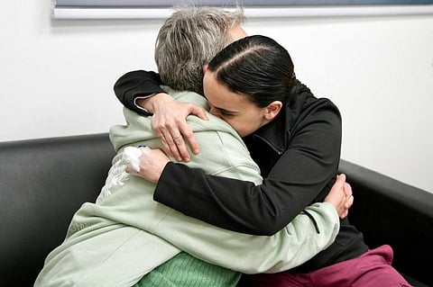 This handout picture released by the Israeli army shows former Israeli hostage Emily Damari with her mother Amanda at an undisclosed location in Israel on 19 January 2025 after a ceasefire and hostage-prisoner exchange deal in the war between Israel and Hamas was implemented. The first three Israeli hostages were released on 19 January under a long-awaited Gaza truce aimed at ending more than 15 months of war that has ravaged the Palestinian territory. The Hostage and Missing Families Forum campaign group had identified the three women set to be released as Emily Damari, Romi Gonen, and Doron Steinbrecher.