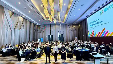 UN 1 - (L-R) UN Philippines Resident Coordinator Gustavo Gonzalez, Ambassador of the Kingdom of the Netherlands to the Philippines Marielle Geraedts, and head of the Human Rights and People’s Empowerment Center Karen Gomez Dumpit together with representatives from civil society organizations pose for a photo during the UN-CSO Engagement Forum on 21 January 2025 in Quezon City, Philippines. The event gathered more than 100 CSOs to establish a collective dialogue and inclusive partnerships for the achievement of the UN Sustainable Development Framework 2024-2028. Photo by UN Philippines.