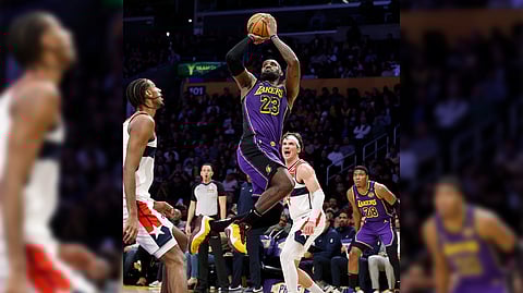 Lebron James dazzles with a triple-double performance to lead the Los Angeles Lakers to a 111-88 victory over the Washington Wizards in the NBA regular season.