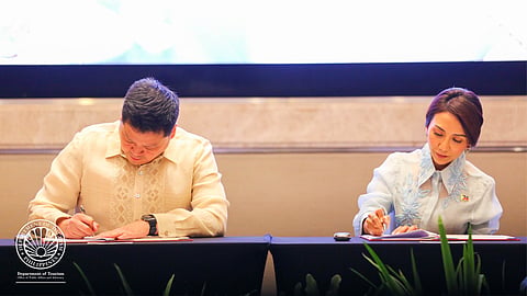 Department of Social Welfare and Development Secretary Rex Gatchalian (left) and Tourism Secretary Christina Garcia Frasco signed the memorandum of agreement on Thursday the Bayanihan sa Bukas na may Pag-asa sa Turismo program, a project aimed at helping disaster-affected tourism front liners in the country.