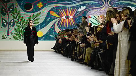 Italian designer Maria Grazia Chiuri acknowledges the applause at the end of Dior's presentation during the Women's Haute-Couture Spring/Summer 2025 Fashion Week at Musee Rodin (The Rodin Museum) in Paris on 27 January 2025.